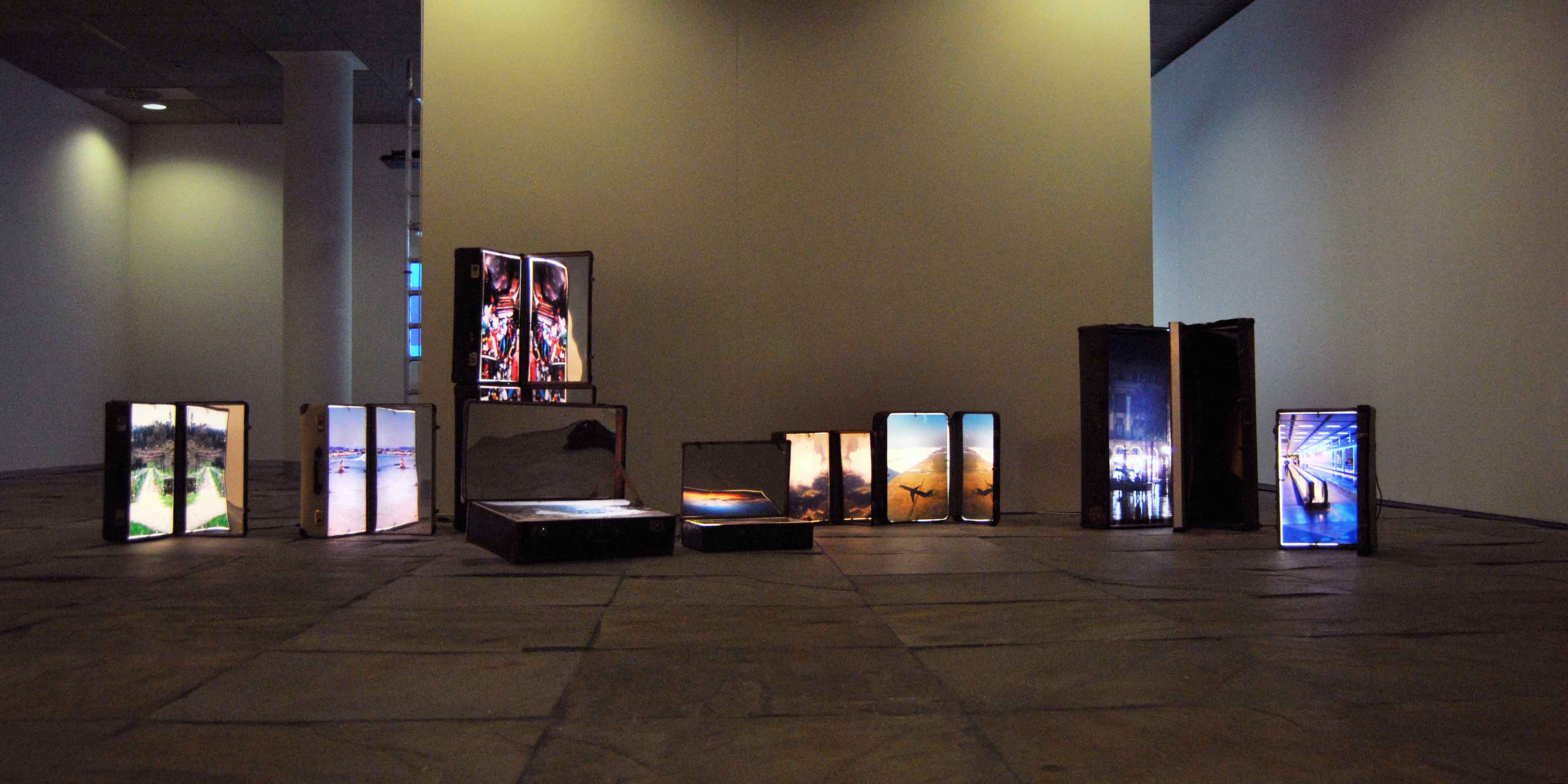 Installation of Chema Alvargonzalez's suitcases in Tránsito Solo exhibition, 2014.